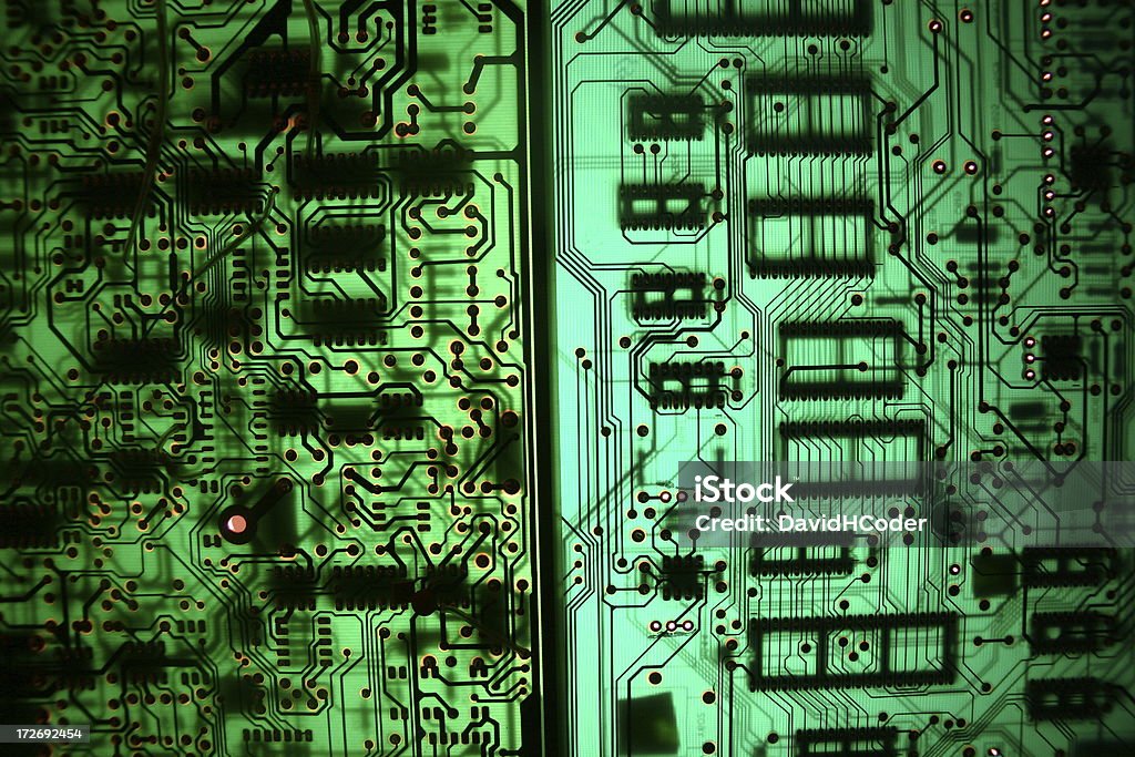 Backlit Circuit Boards - Green "Two backlit circuit boards, both the standard green." Abstract Stock Photo