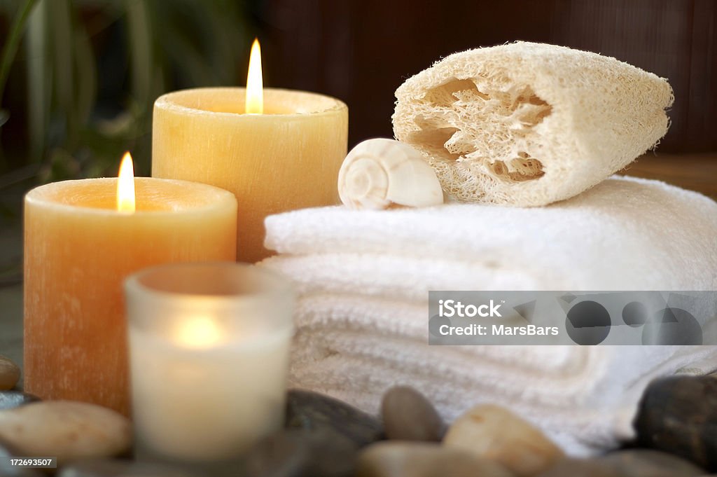 bath items in relaxing setting "Relaxing, candle-lit spa and bath items. You may also like:" Animal Shell Stock Photo