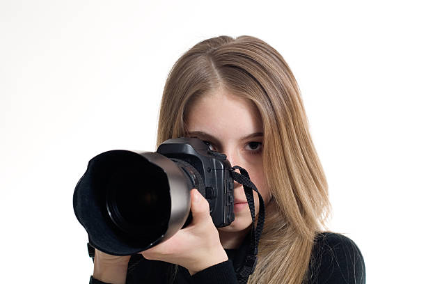 Female Photographer with Camera Female photographer holding camera.Similar: sports photography stock pictures, royalty-free photos & images