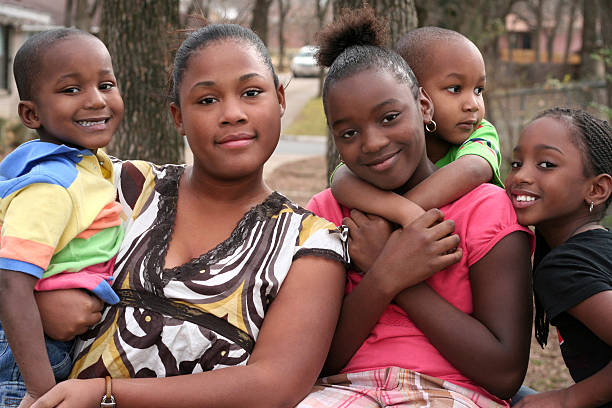 istock Five young family members smiling for photo 172694726