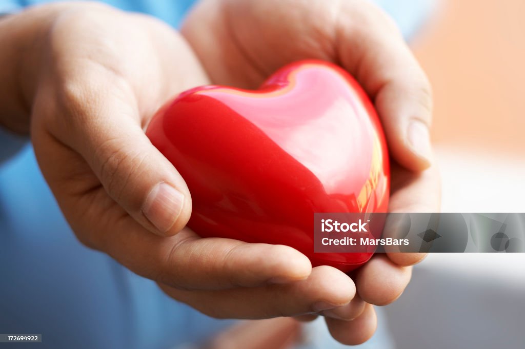 Cura per il cuore - Foto stock royalty-free di Affettuoso
