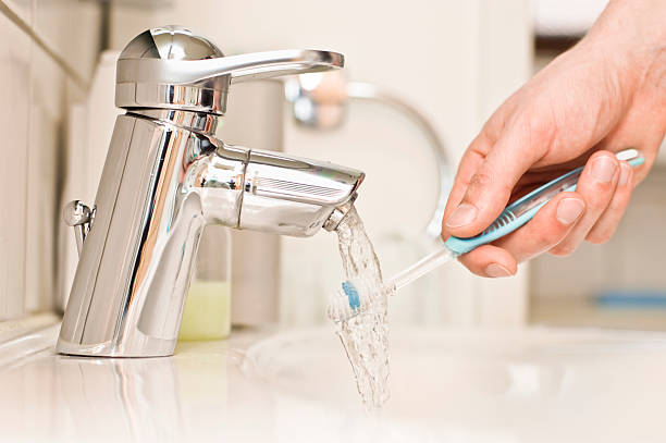 istock Washing the Toothbrush 172694966
