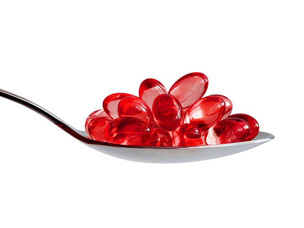 таблетки для вас - capsule vitamin pill red lecithin стоковые фото и изображения