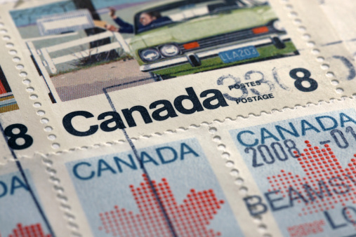 Macro detail of an envelope from Canada showing stamps with cancellation mark from 2008. Shallow DOF