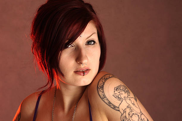 istock Beautiful Redhead with Tattoo 172696085