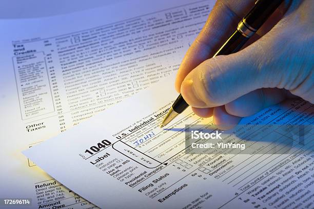 Filling Out U S Income Tax Hz Stock Photo - Download Image Now - Tax, Tax Form, 1040 Tax Form