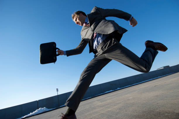 istock Businessman On The Run City Sidewalk 172696604