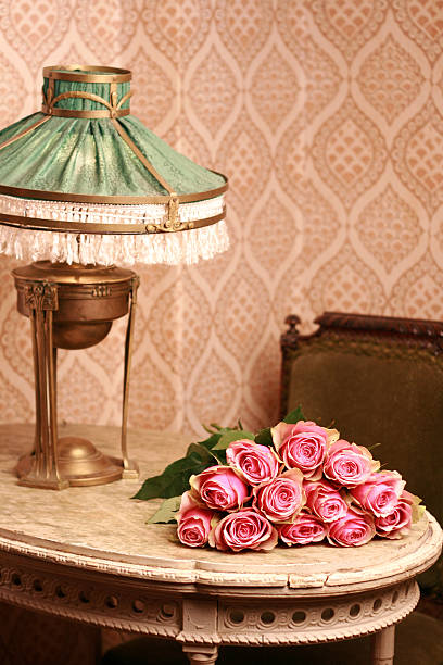 vintage home interior with roses on a marble table