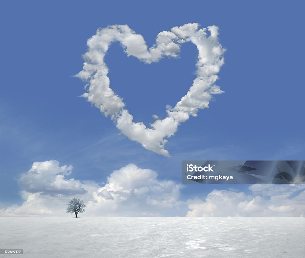 Clouds of Love 5 Lonely tree and winter landscape with clouds in the shape of heart. Landscape - Scenery Stock Photo