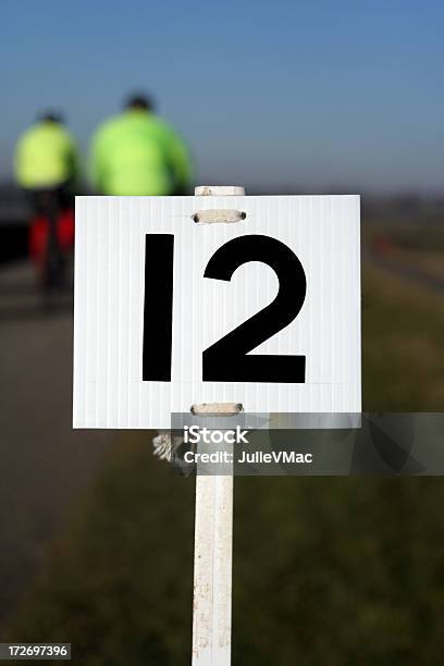 Number Twelve Stock Photo - Download Image Now - Competition, Cycling, Directional Sign