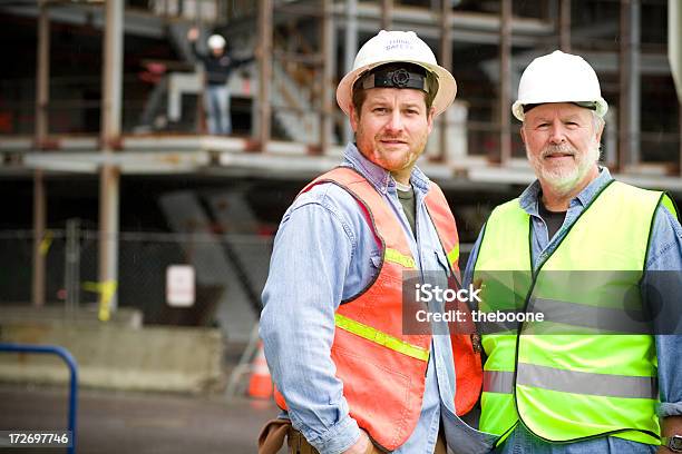 A Handsome Portraits Of Two Construction Workers Stock Photo - Download Image Now - Son, 25-29 Years, 60-64 Years