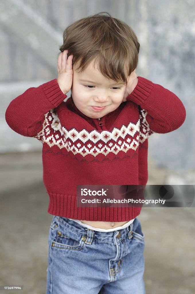 Toddler Boy Hears no Evil "See no Evil, Hear no Evil, Speak no Evil. See more of this model in our portfolio." Hands Covering Ears Stock Photo