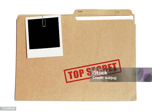 Top Secret File In A Folder With A Polaroid Attached Stock Photo - Download Image Now