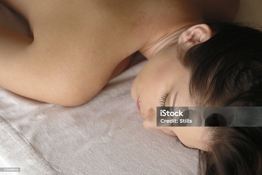 beauty spa massage spa and beauty and health beautiful woman on massage tableClick thumbnail for more images of this model: Adult Stock Photo