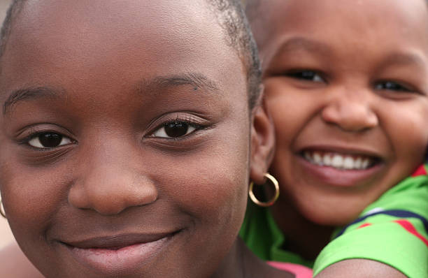 istock Girls grinning during a piggy back ride 172698506