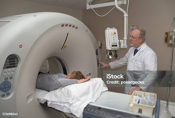 Radiology Technician With Ct Scanner Stock Photo - Download Image Now - CAT Scan, CAT Scan Machine, Data