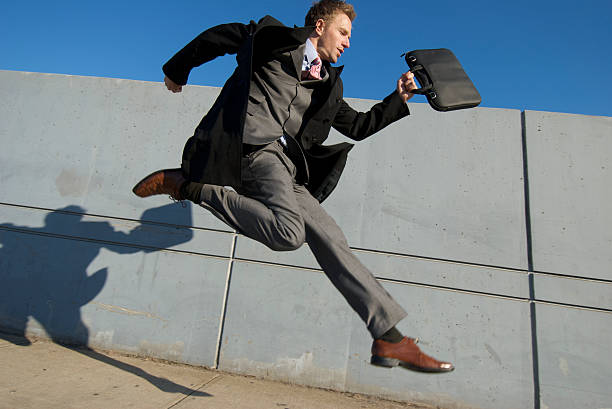 istock Businessman Running Late on City Sidewalk 172699092