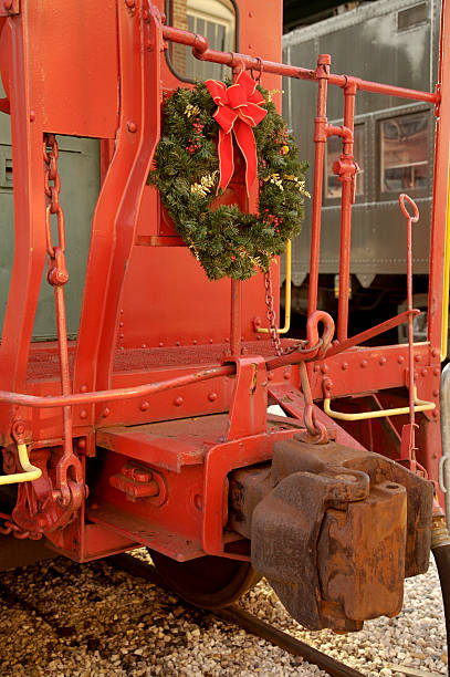 Christmas wreath on caboose stock photo