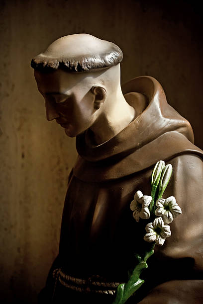 st augustine monk monk wooden painted figure in Cathedral Basilica of St. Augustine st anthony of padua stock pictures, royalty-free photos & images