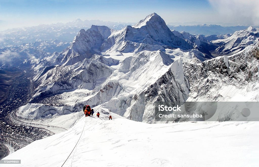 climbing everest Mountaineers climbing Everest Mt. Everest Stock Photo
