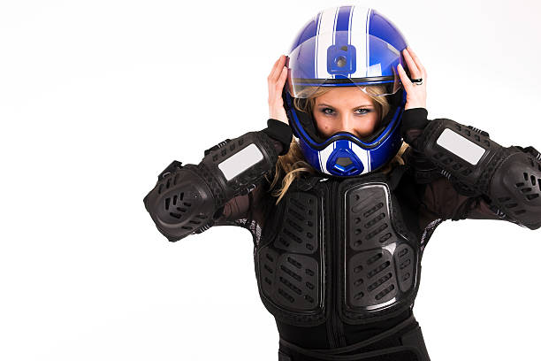 Atraente mulher sexy em motoracer uniforme - foto de acervo