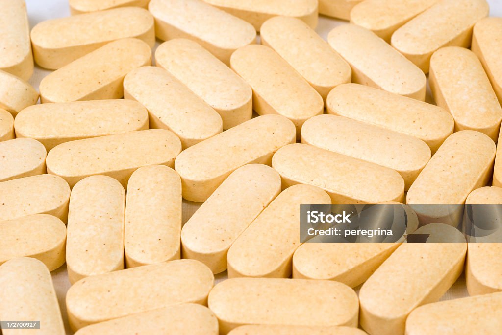 Comprimidos de color amarillo - Foto de stock de Amarillo - Color libre de derechos