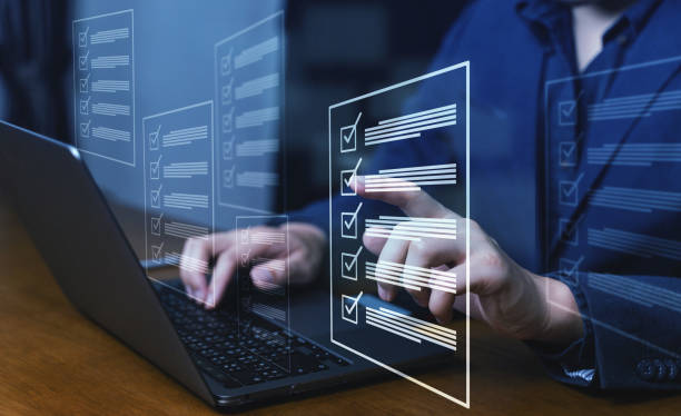 istock Online survey filling out and digital form checklist quality check improvement. Standardization, certification. Compliance to regulations service and standards, customer feedback online, Testimonial 1727010339