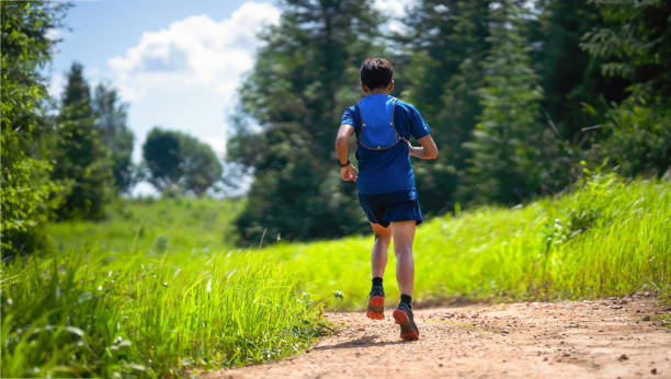 istock Trail runner practice speed run in the jungle road 1727012942