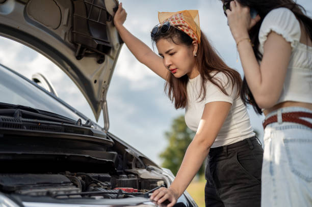 istock A confused Asian female is calling technical support service centre, car is broken during the trip. 1727017310