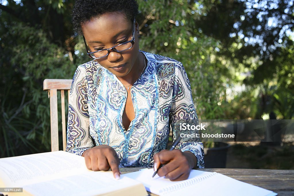 Studying Young woman studying for exams 20-29 Years Stock Photo