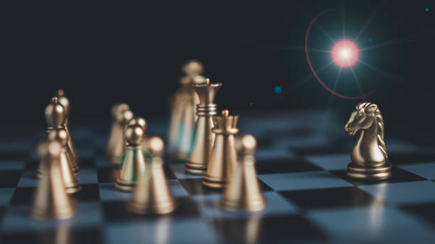 istock Gold and silver chess pieces in chess board game for business comparison. Leadership concepts, human resource management concepts. 1727031830