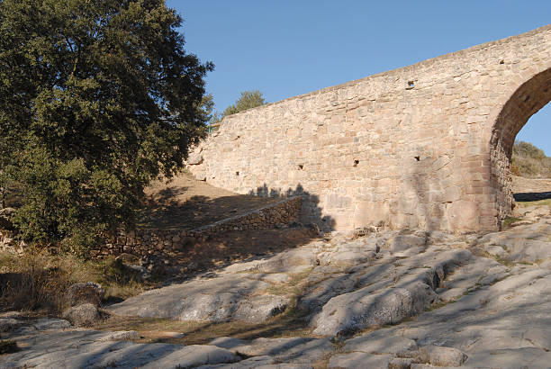 istock beginning of the old stone bridge 172703292