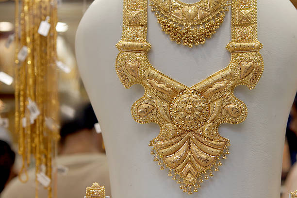 Golden Splendor, Exquisite handcrafted gold jewelry displayed in the bustling streets and traditional workshops of Istanbul.