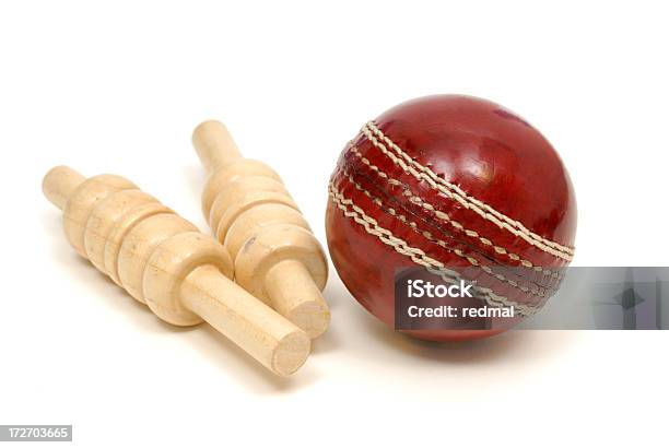 Close Up Of Red Leather Cricket Ball And Two Wooden Bails Stock Photo - Download Image Now