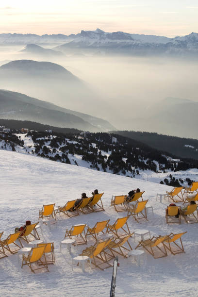 liegestühle - people winter urban scene chair stock-fotos und bilder