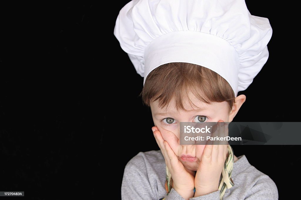 Pequeno Chef com triste Expression-, queimado os'cookies'! - Royalty-free Chefe de Cozinha Foto de stock