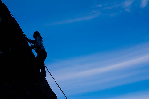 rock climbing stock photo