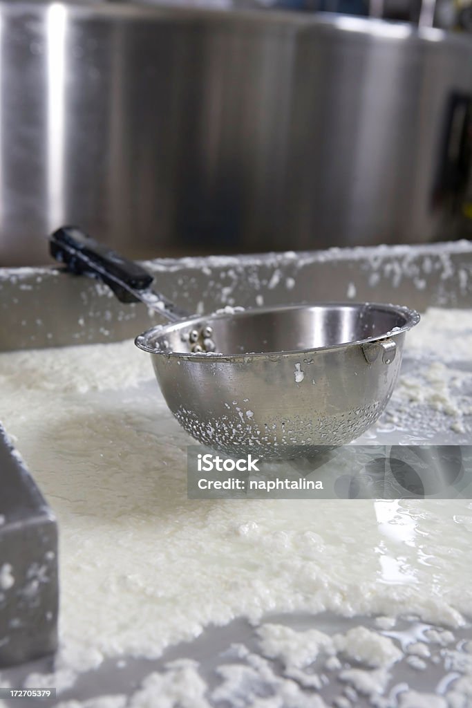 milk and cheese Detail of a kitchen utensil used to produce cheese. Alloy Stock Photo