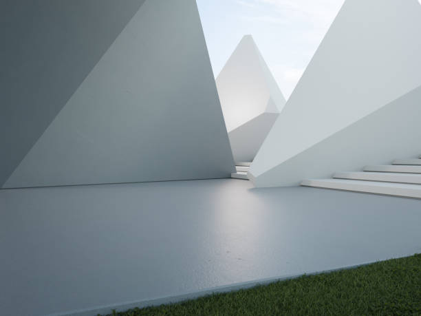 istock Geometric shapes structure with gray concrete floor on green grass lawn. 1727055874