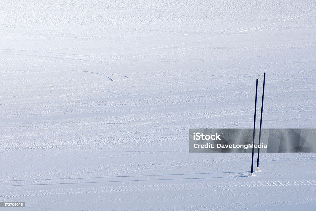 Downhill Skiing Blue gates on a practice slalom course. Backgrounds Stock Photo