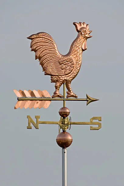 A copper weathercock.