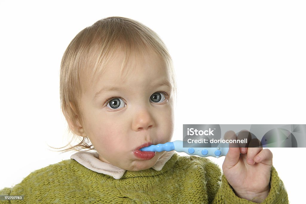 dental care baby brushing his teeth close up Babies Only Stock Photo