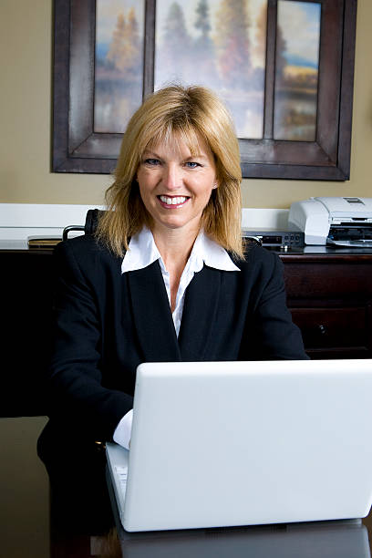 istock Businesswoman with Laptop in Office 172708005