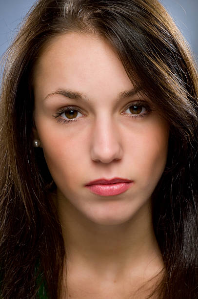 istock depressed blank looking young woman 172708351