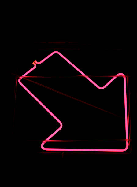istock Pink Neon Arrow Sign on Black Background 172709109