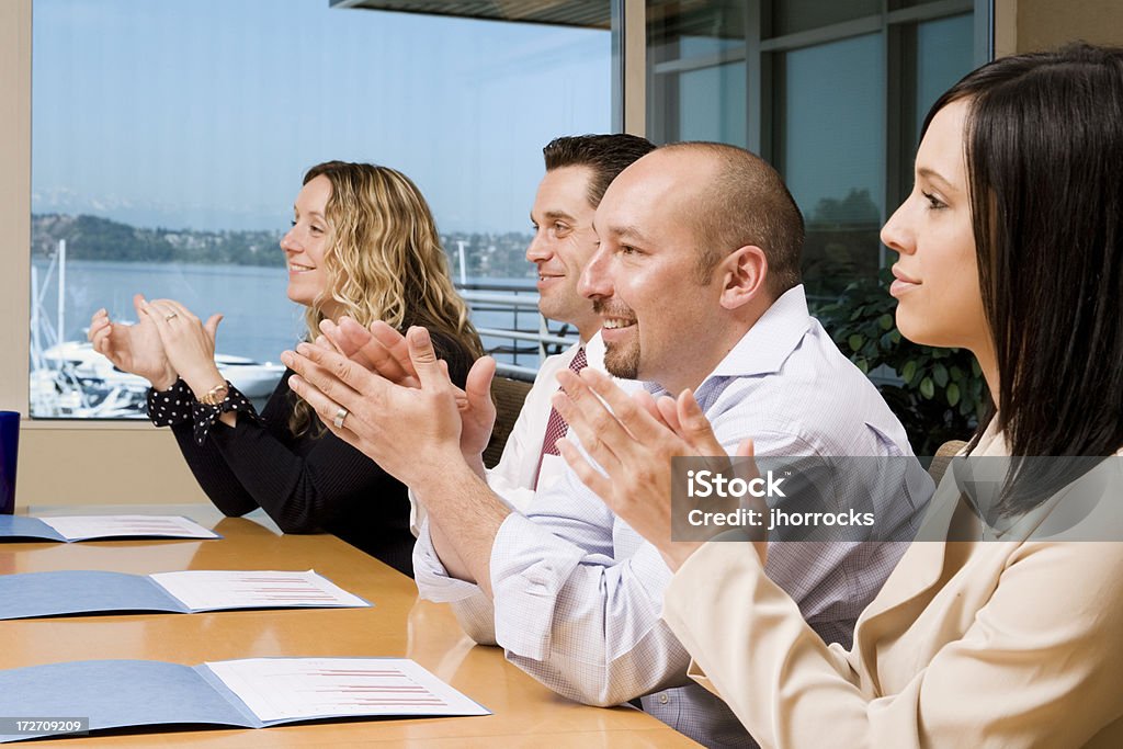 I partecipanti ai Meeting Applaudire - Foto stock royalty-free di Abbigliamento elegante