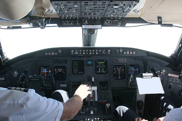 istock Commercial airplane landing on airport...pilot checking data 172710249