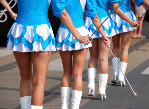 pretty drum majorettes at a festival