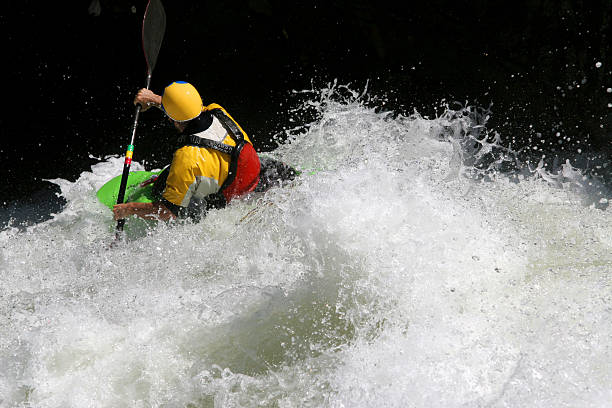 левая - white water atlanta kayak rapid kayaking стоковые фото и изображения