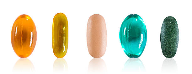 pílulas variados com traçado de recorte - capsule pill lecithin fish oil - fotografias e filmes do acervo